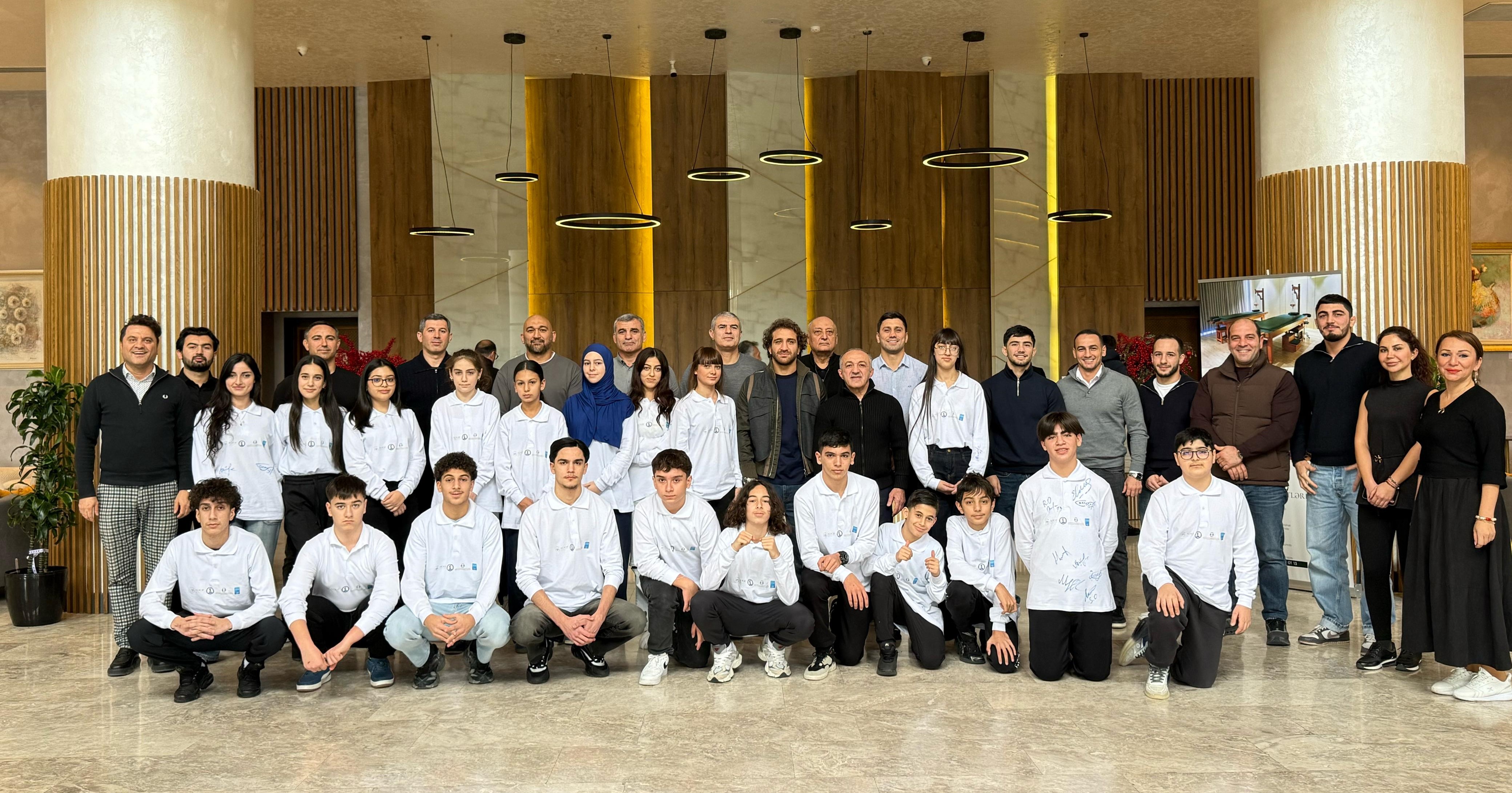 Olimpiya çempionları şəhid övladları ilə görüşüb